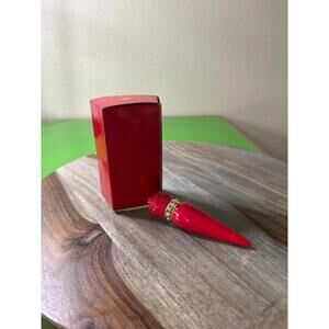 Christian Louboutin SooooO Glow Refillable Lipstick Case in the shade red.